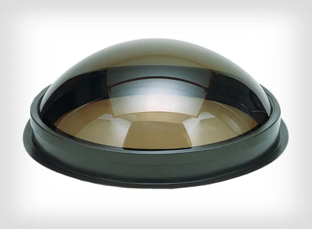 Columbia circular roof dome skylight with bronze tinted acrylic glazing and integrated curb